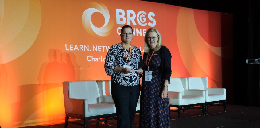 Emily Varnon received the award on behalf of NSF at the BRCGS Connect Americas event.