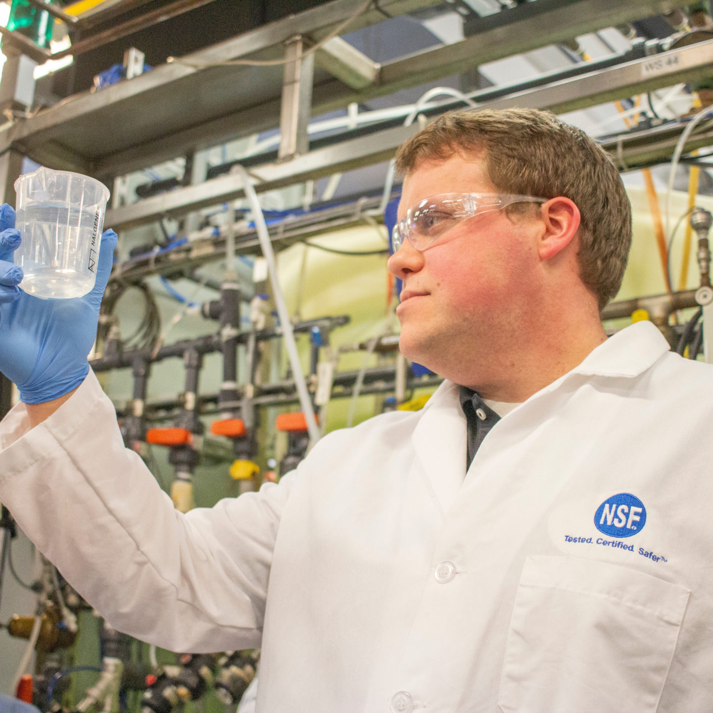 NSF scientist in lab | NSF International