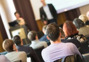 Crowd in public health conference - Moore and Kalakay Elected to NSF Council of Public Health Consultants | NSF International