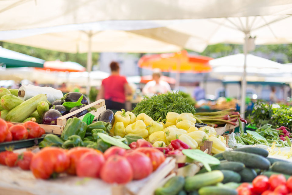 Farmers market stall with variety of organic vegetable