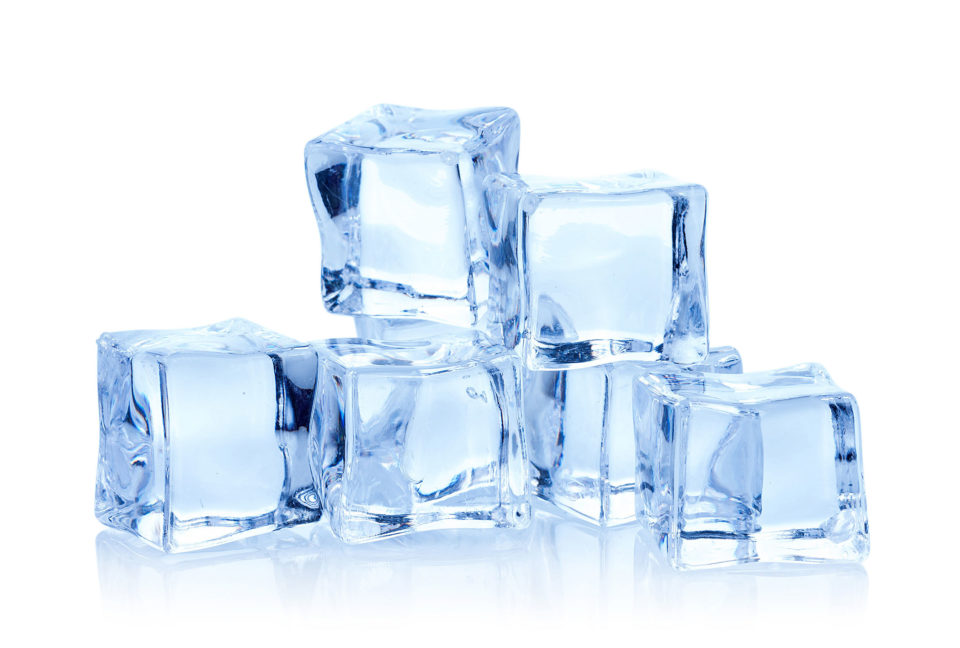 Close-up of ice cubes against white background