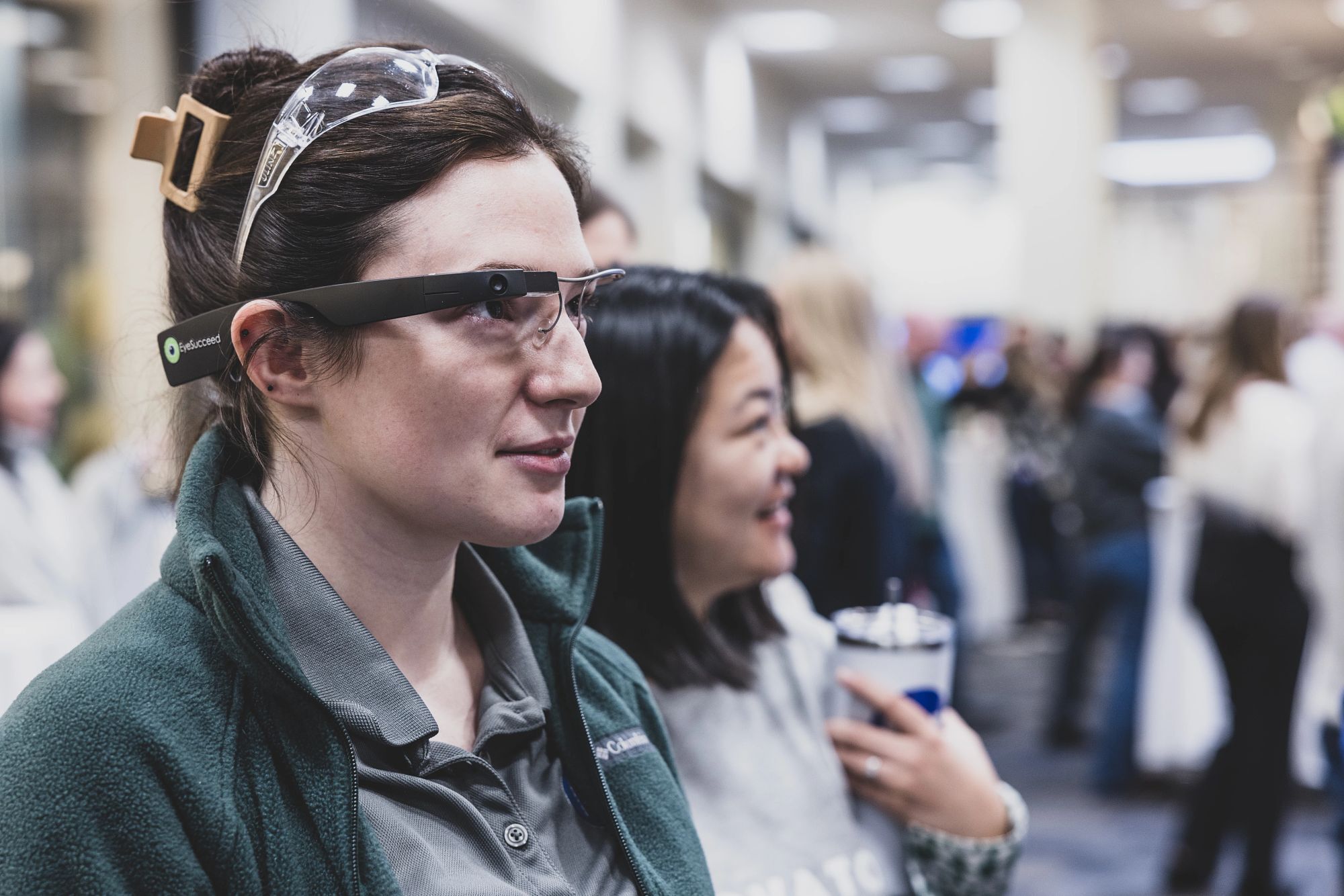 NSF employee wearing NSF EyeSucceed glasses during a demonstration - Celebrating 80 Years of Improving Human and Planet Health | NSF