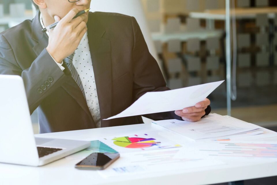 Manager analyzing report 71294065
