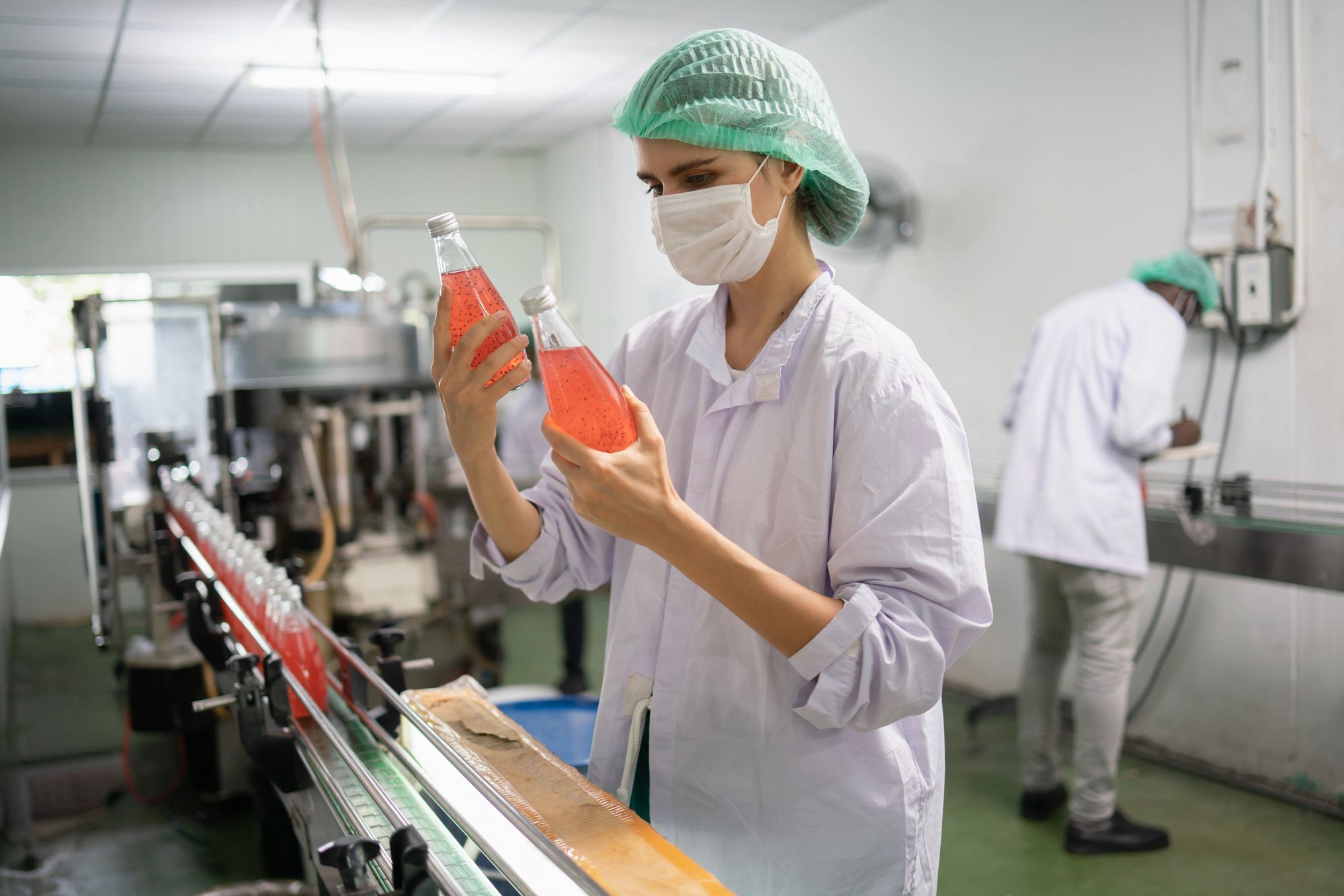 Woman working in a food processing factory warehouse.Women control the production of the food industry.Processing food export warehouse business.